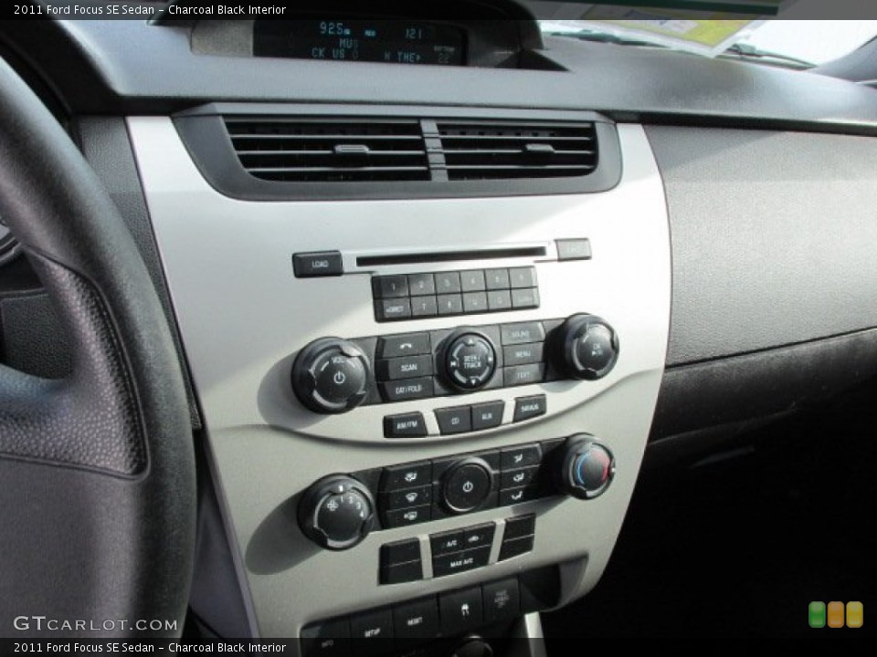 Charcoal Black Interior Controls for the 2011 Ford Focus SE Sedan #76350244
