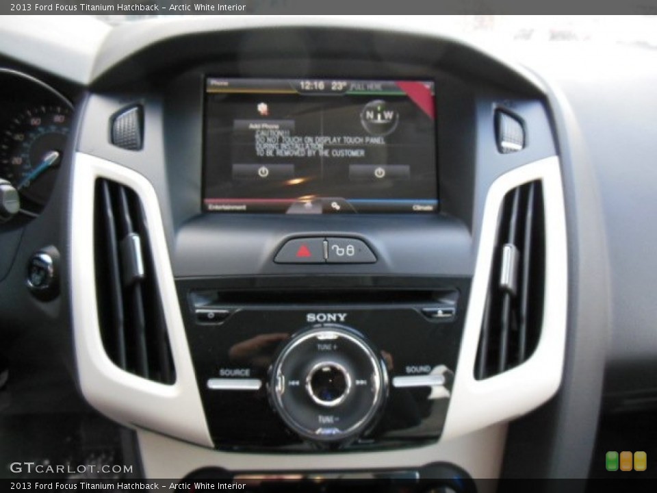 Arctic White Interior Controls for the 2013 Ford Focus Titanium Hatchback #76350848