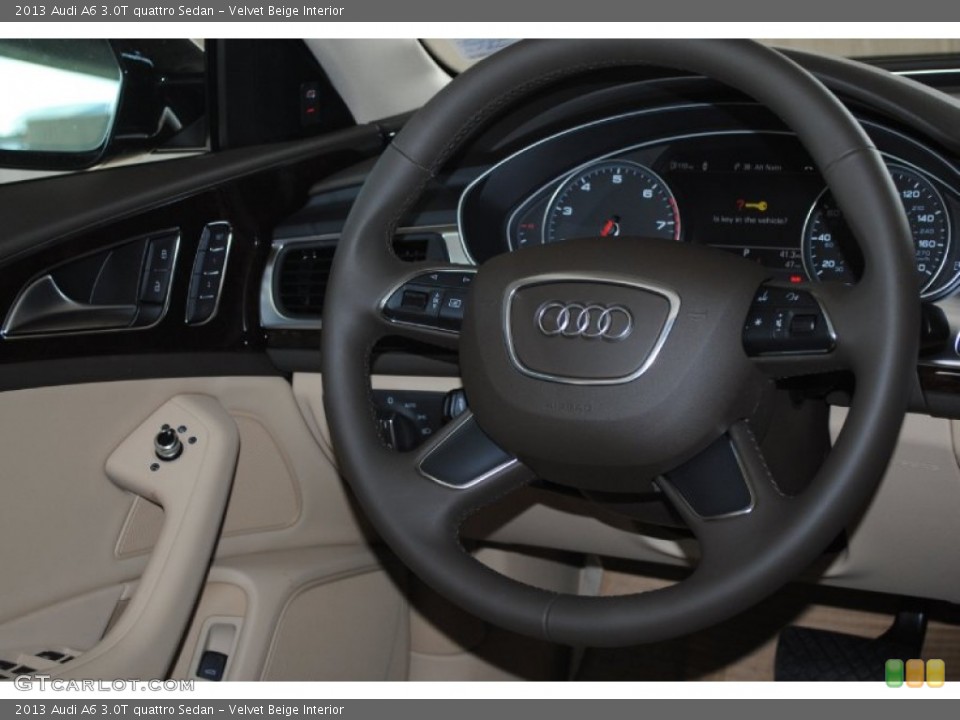 Velvet Beige Interior Steering Wheel for the 2013 Audi A6 3.0T quattro Sedan #76360257