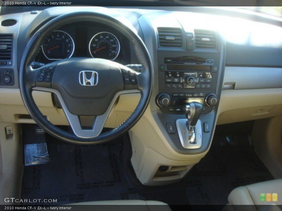 Ivory Interior Dashboard for the 2010 Honda CR-V EX-L #76361206