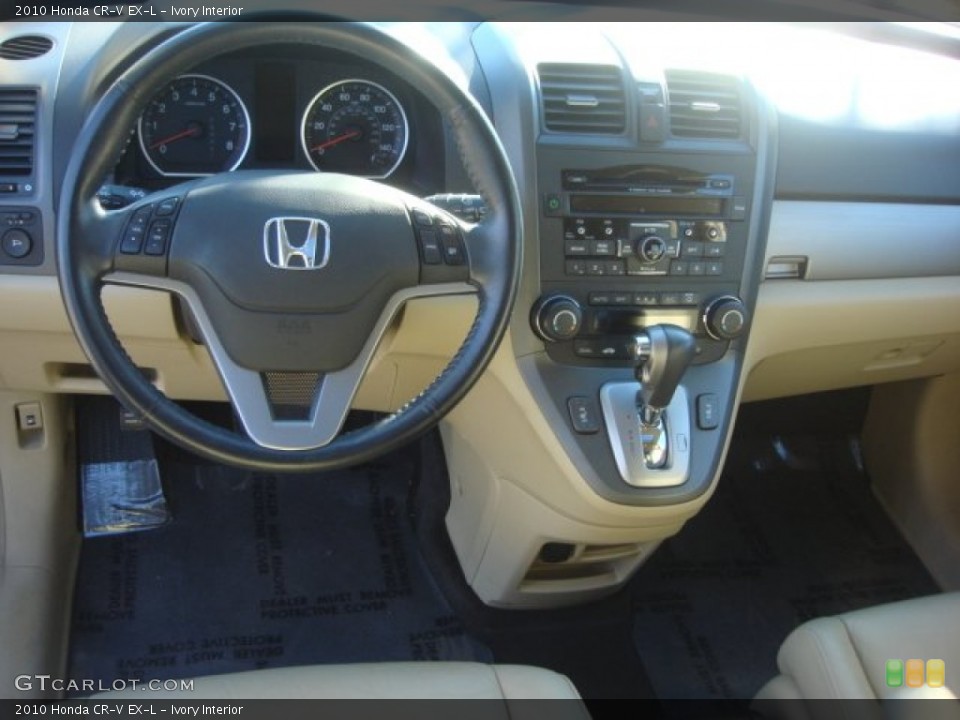 Ivory Interior Dashboard for the 2010 Honda CR-V EX-L #76361272