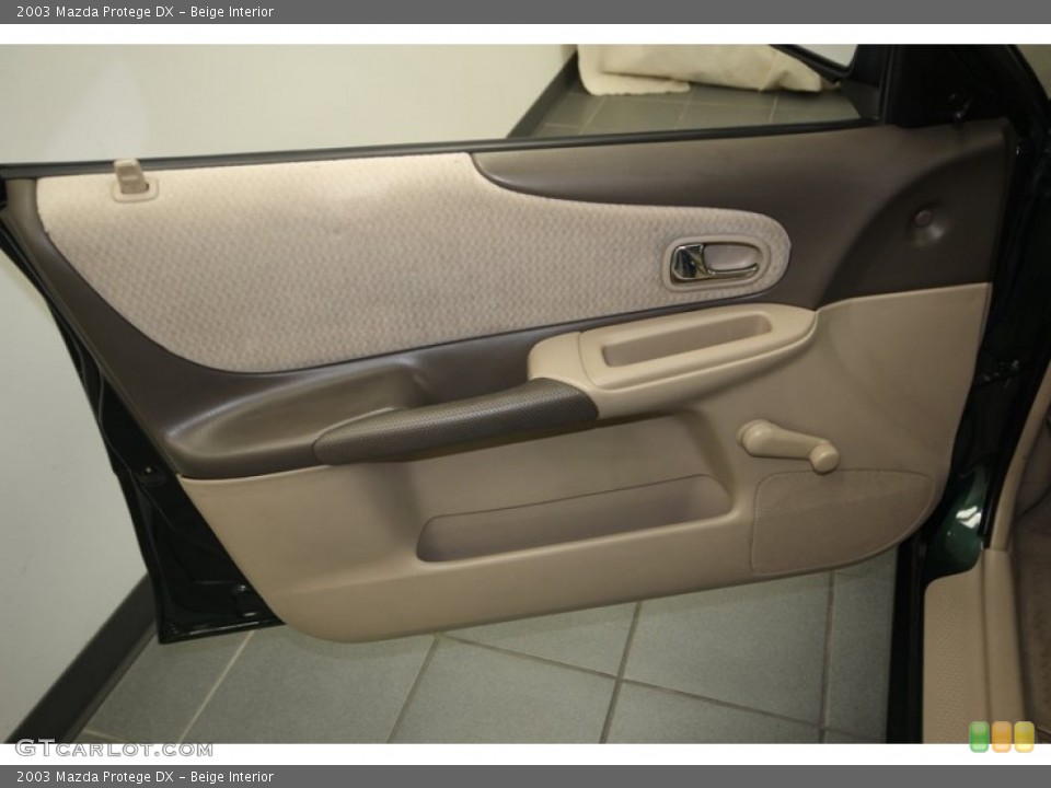 Beige Interior Door Panel for the 2003 Mazda Protege DX #76384654