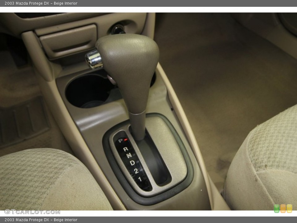Beige Interior Transmission for the 2003 Mazda Protege DX #76384690