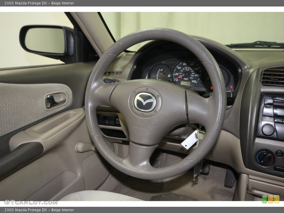 Beige Interior Steering Wheel for the 2003 Mazda Protege DX #76384718