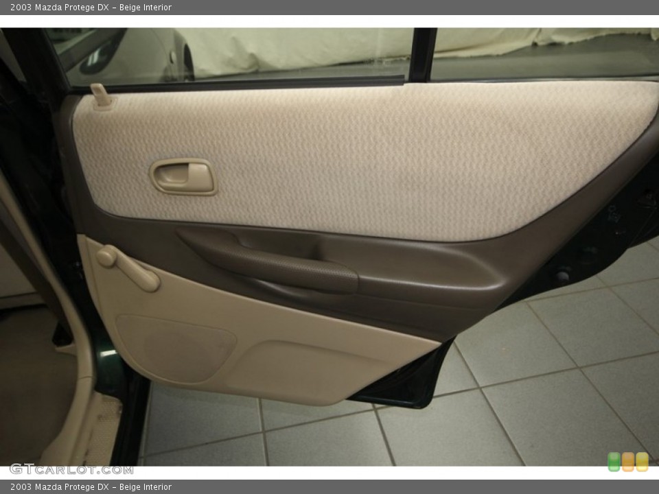 Beige Interior Door Panel for the 2003 Mazda Protege DX #76384759