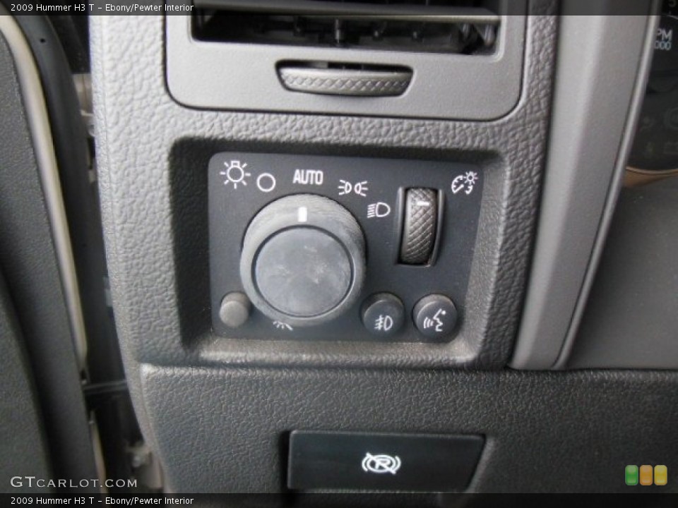 Ebony/Pewter Interior Controls for the 2009 Hummer H3 T #76391600