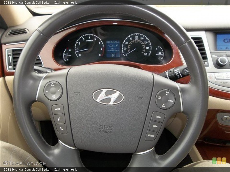 Cashmere Interior Steering Wheel for the 2012 Hyundai Genesis 3.8 Sedan #76395583