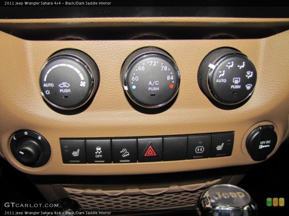 Black/Dark Saddle Interior Controls for the 2011 Jeep Wrangler Sahara 4x4 #76398684