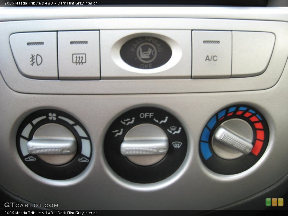 Dark Flint Gray Interior Controls for the 2006 Mazda Tribute s 4WD #76436478