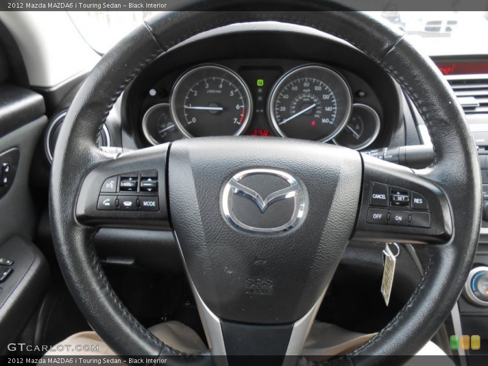 Black Interior Steering Wheel for the 2012 Mazda MAZDA6 i Touring Sedan #76438607