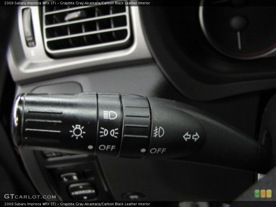 Graphite Gray Alcantara/Carbon Black Leather Interior Controls for the 2009 Subaru Impreza WRX STi #76467585