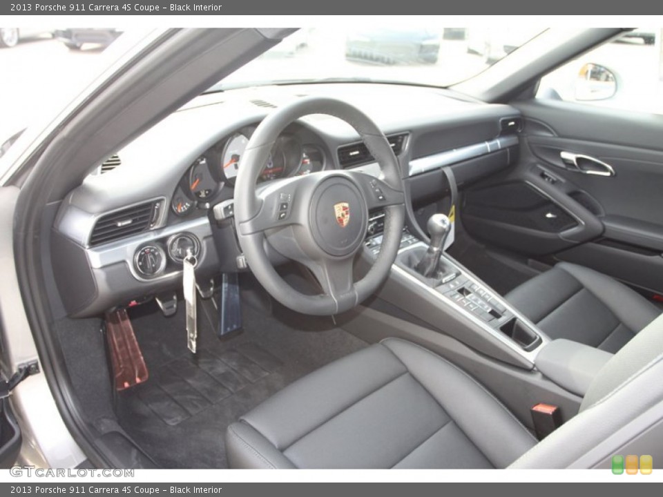 Black Interior Prime Interior for the 2013 Porsche 911 Carrera 4S Coupe #76471763