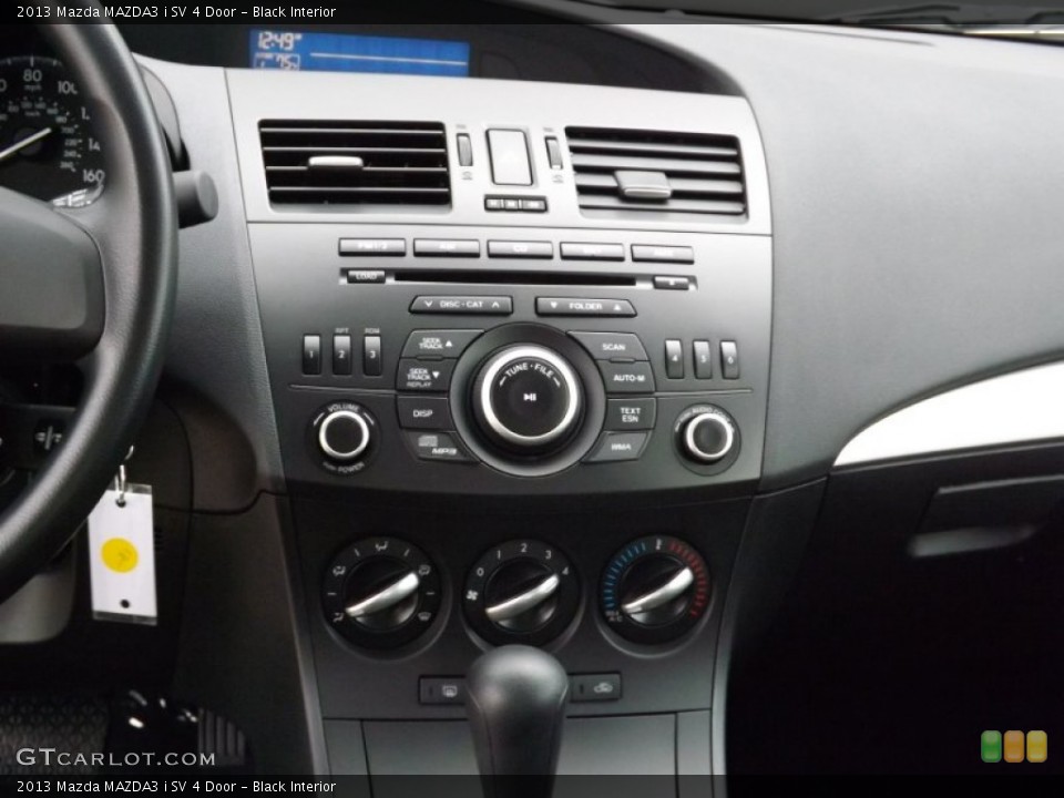 Black Interior Controls for the 2013 Mazda MAZDA3 i SV 4 Door #76481171