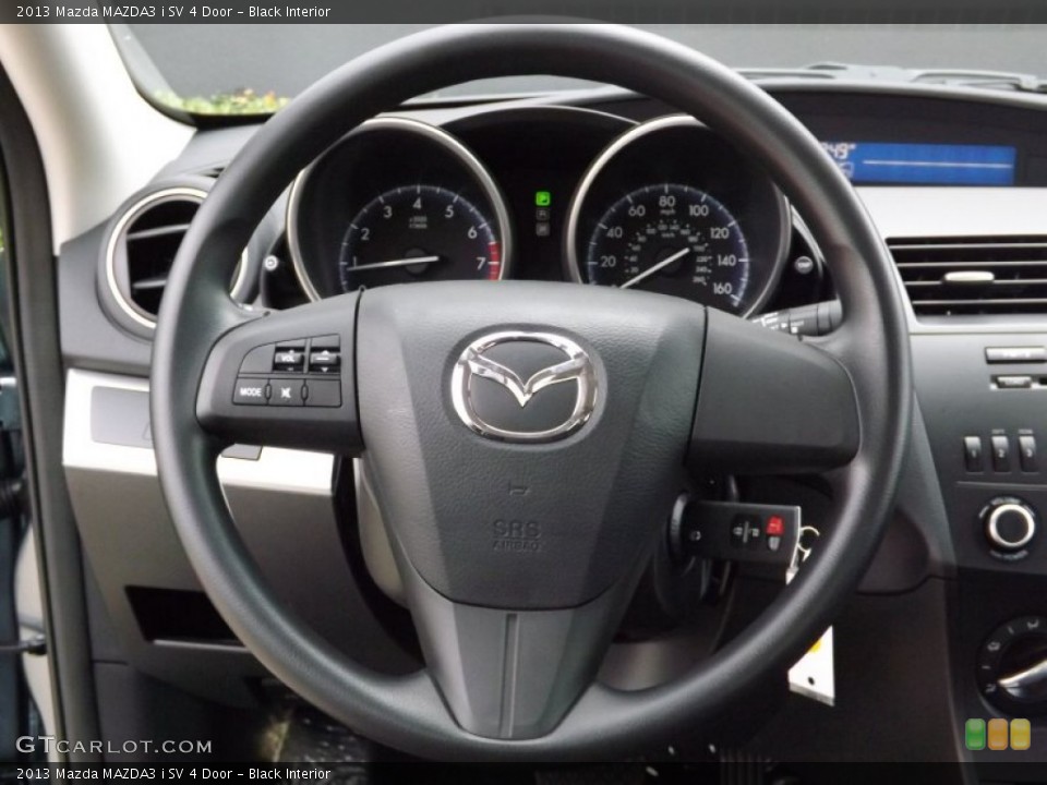 Black Interior Steering Wheel for the 2013 Mazda MAZDA3 i SV 4 Door #76481186