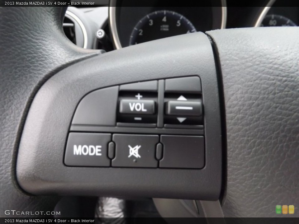 Black Interior Controls for the 2013 Mazda MAZDA3 i SV 4 Door #76481195