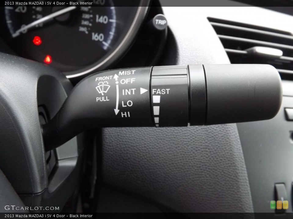 Black Interior Controls for the 2013 Mazda MAZDA3 i SV 4 Door #76481210
