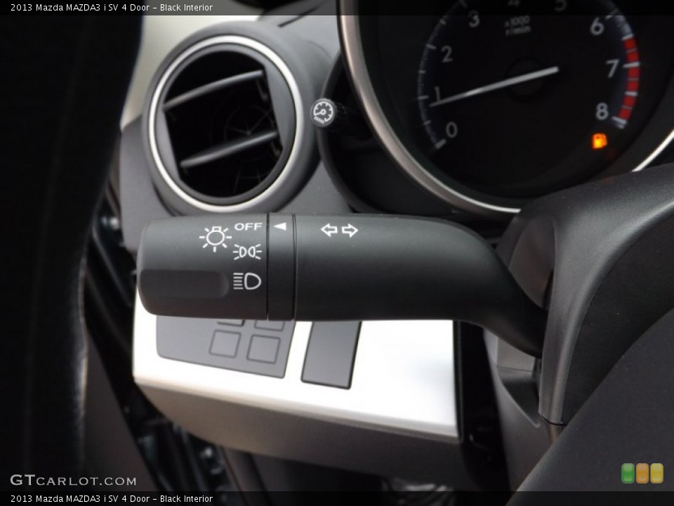 Black Interior Controls for the 2013 Mazda MAZDA3 i SV 4 Door #76481222