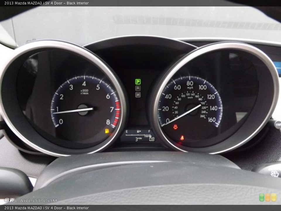 Black Interior Gauges for the 2013 Mazda MAZDA3 i SV 4 Door #76481252