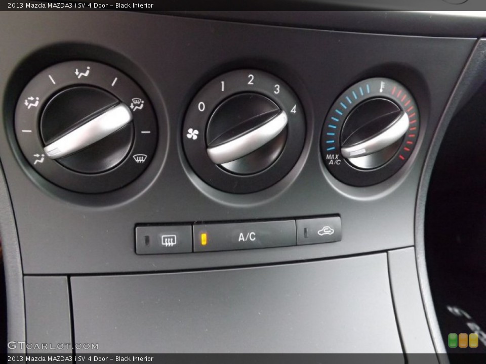 Black Interior Controls for the 2013 Mazda MAZDA3 i SV 4 Door #76481267