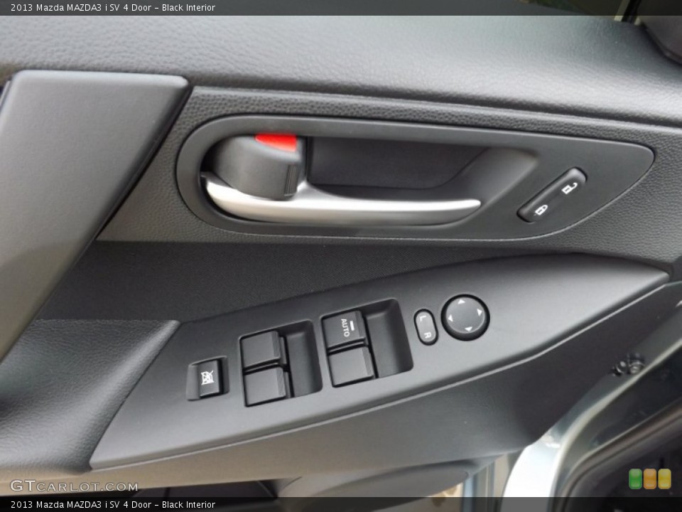 Black Interior Controls for the 2013 Mazda MAZDA3 i SV 4 Door #76481342
