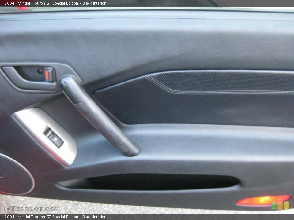 Black Interior Door Panel for the 2004 Hyundai Tiburon GT Special Edition #76484153