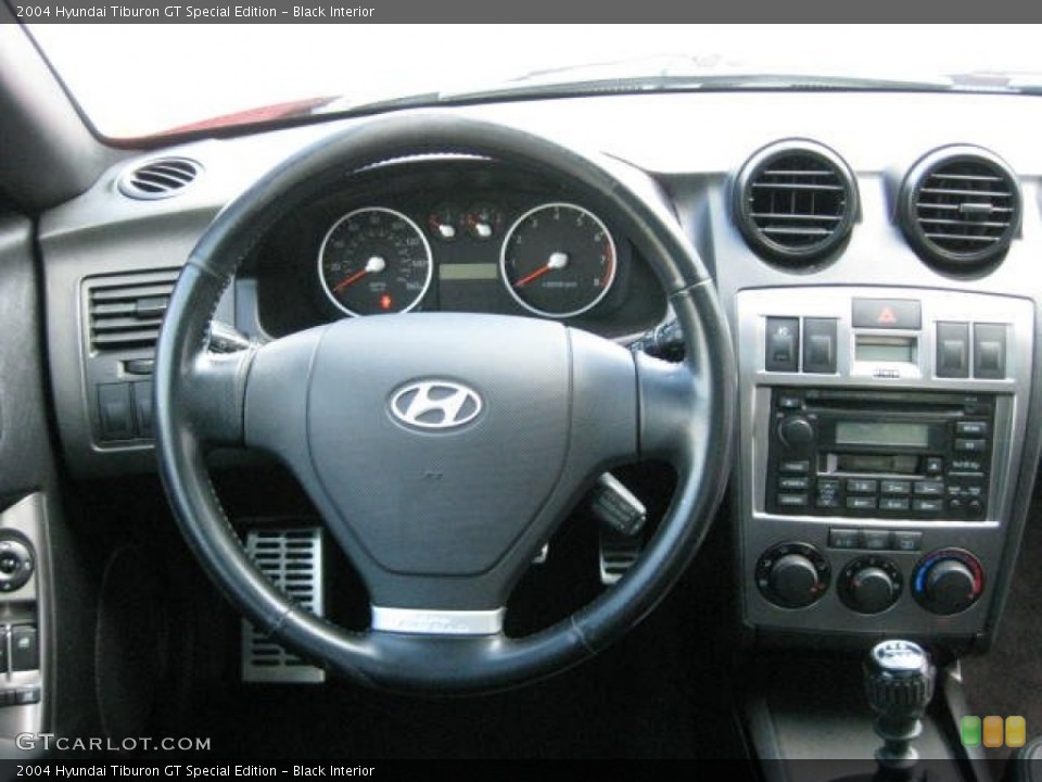 Black Interior Dashboard for the 2004 Hyundai Tiburon GT Special Edition #76484168