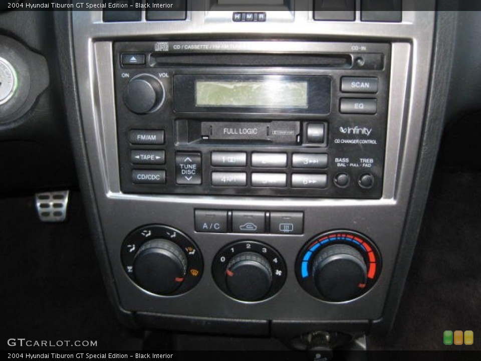 Black Interior Controls for the 2004 Hyundai Tiburon GT Special Edition #76484177
