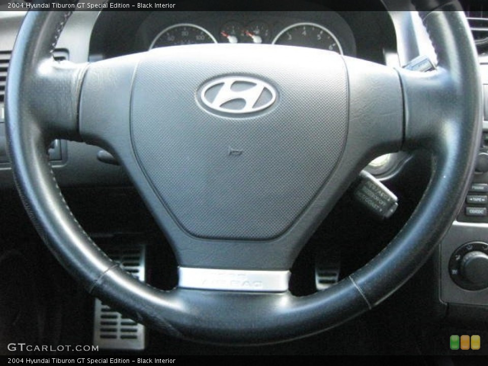 Black Interior Steering Wheel for the 2004 Hyundai Tiburon GT Special Edition #76484207