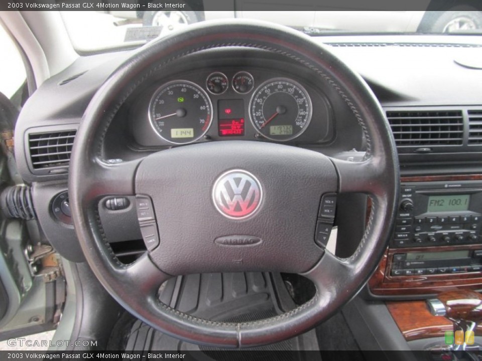 Black Interior Steering Wheel for the 2003 Volkswagen Passat GLX 4Motion Wagon #76506114