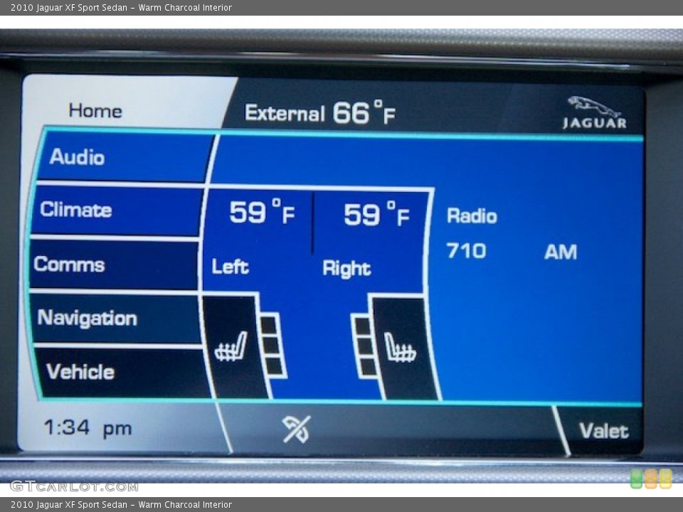 Warm Charcoal Interior Controls for the 2010 Jaguar XF Sport Sedan #76507169