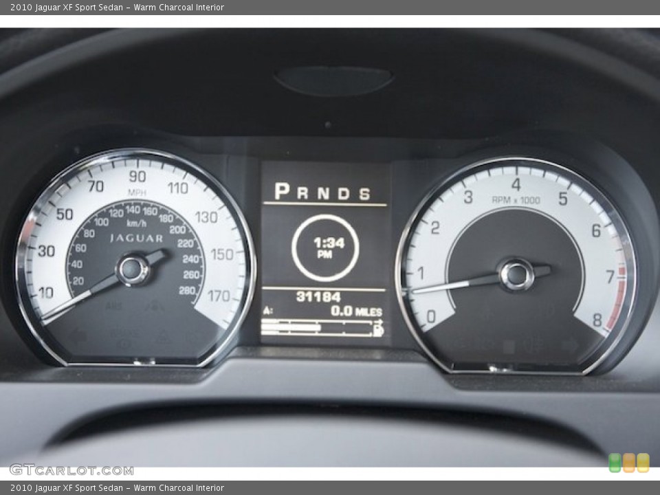 Warm Charcoal Interior Gauges for the 2010 Jaguar XF Sport Sedan #76507218