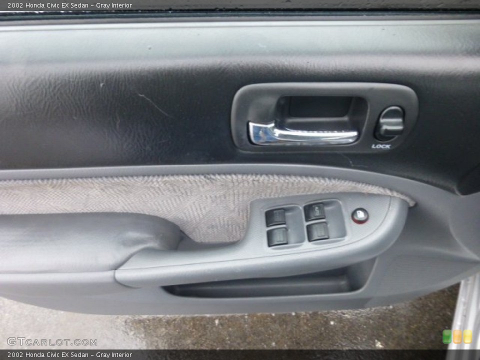 Gray Interior Door Panel for the 2002 Honda Civic EX Sedan #76521566