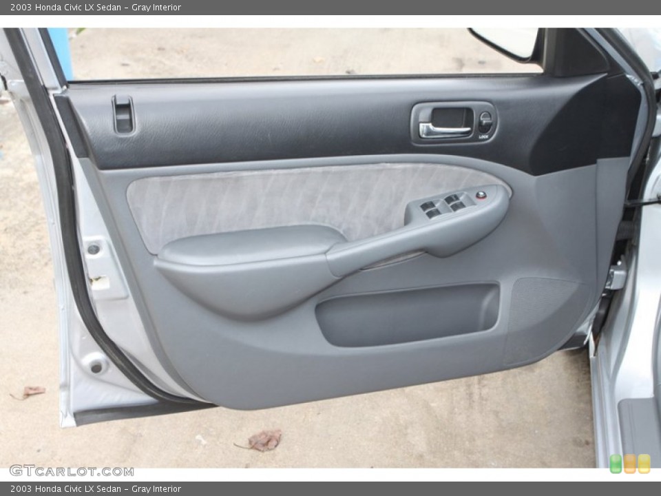 Gray Interior Door Panel for the 2003 Honda Civic LX Sedan #76527464