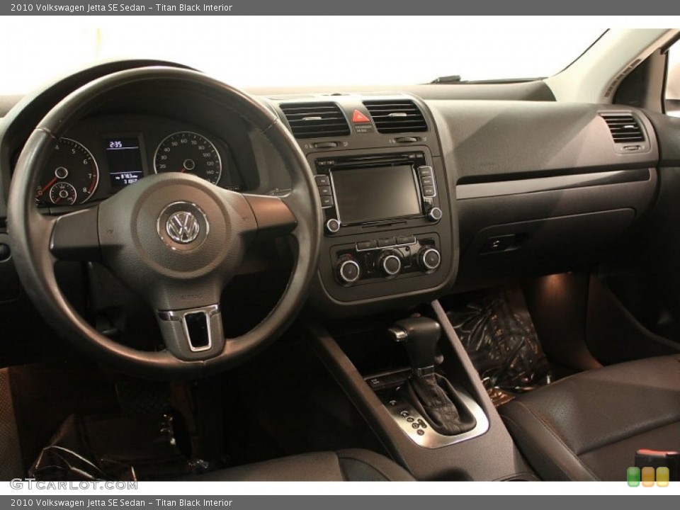 Titan Black Interior Dashboard for the 2010 Volkswagen Jetta SE Sedan #76536500