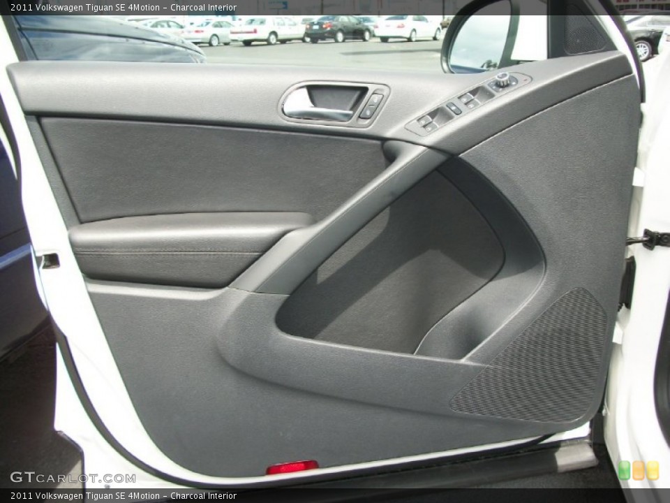 Charcoal Interior Door Panel for the 2011 Volkswagen Tiguan SE 4Motion #76541974