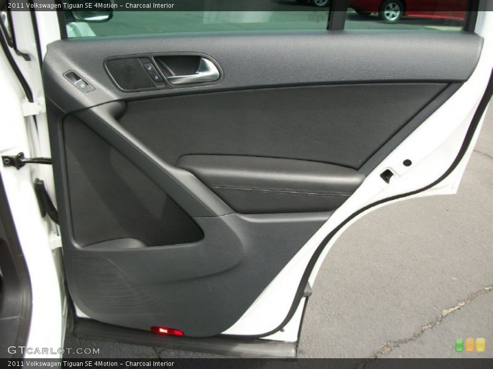 Charcoal Interior Door Panel for the 2011 Volkswagen Tiguan SE 4Motion #76542053
