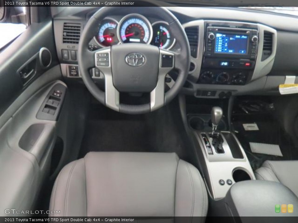 Graphite Interior Dashboard for the 2013 Toyota Tacoma V6 TRD Sport Double Cab 4x4 #76566241