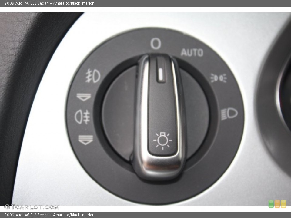 Amaretto/Black Interior Controls for the 2009 Audi A6 3.2 Sedan #76569592
