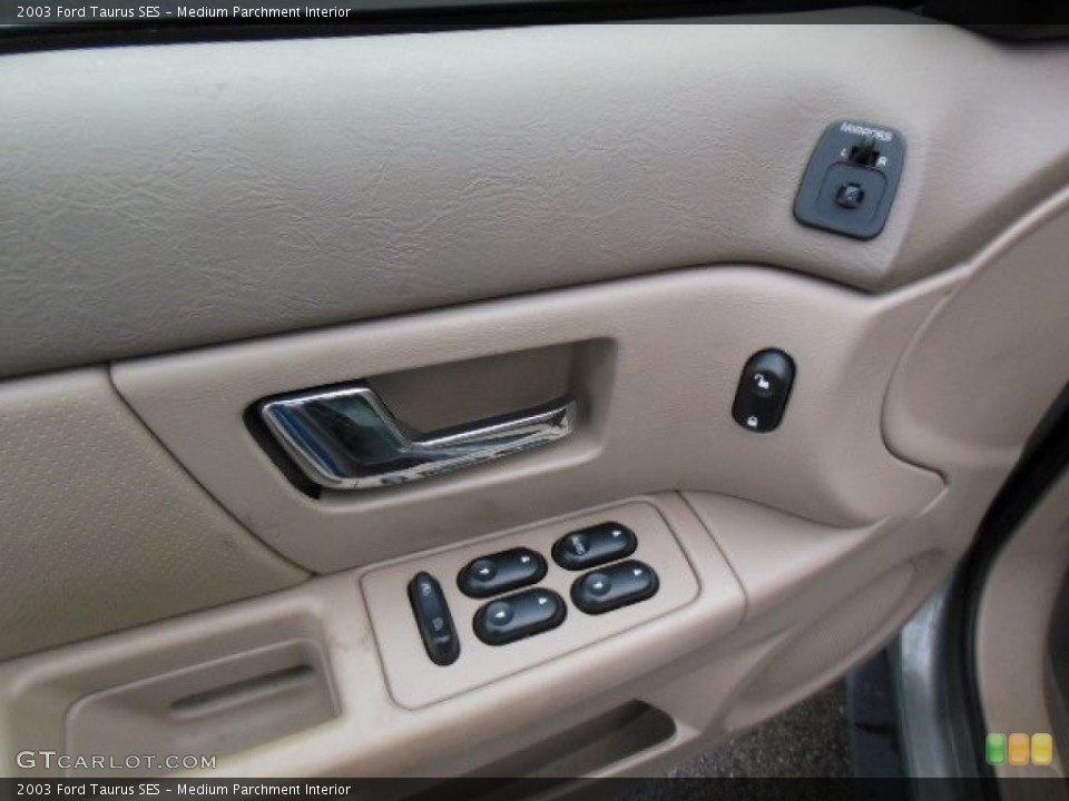 Medium Parchment Interior Controls for the 2003 Ford Taurus SES #76596166