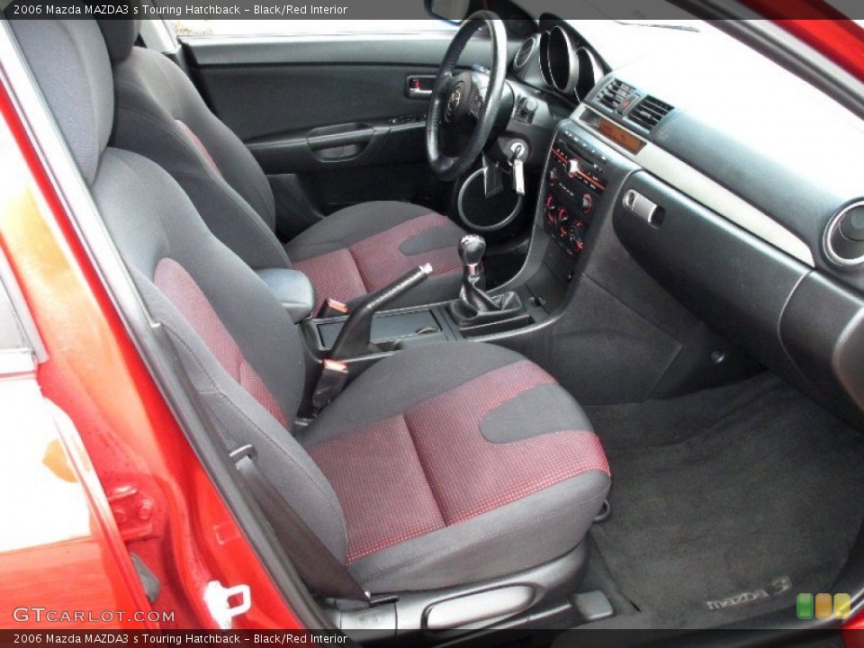 Black/Red Interior Photo for the 2006 Mazda MAZDA3 s Touring Hatchback #76599732