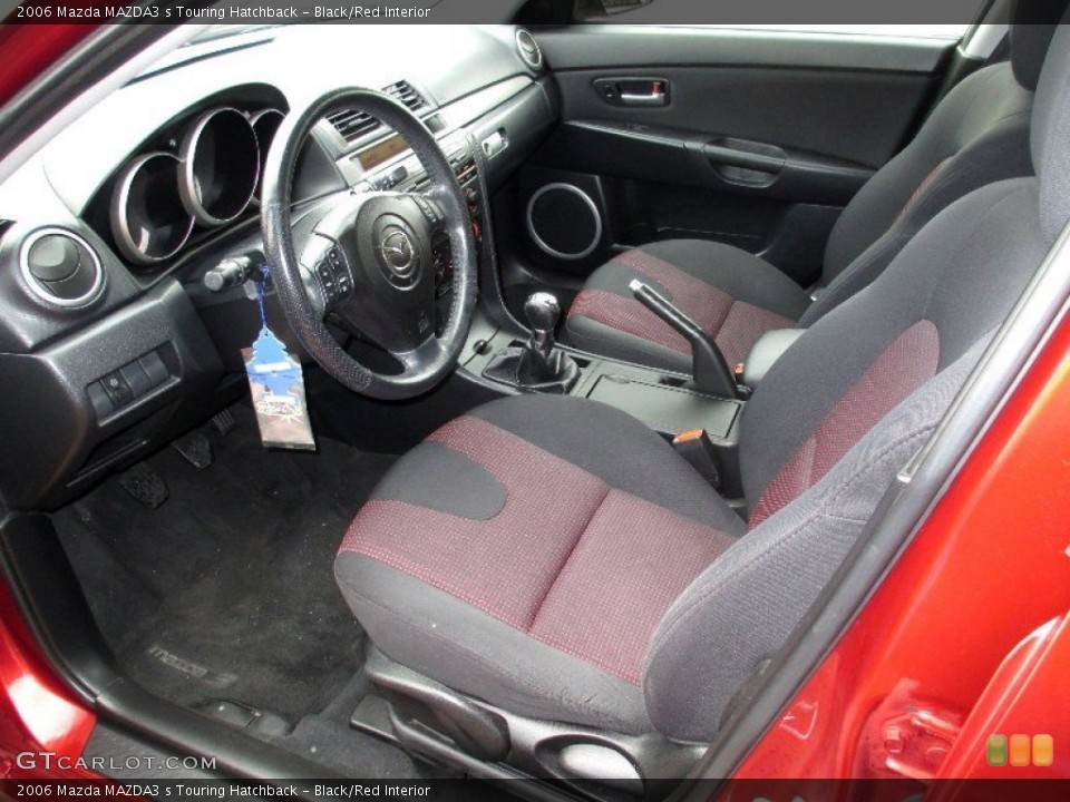 Black/Red Interior Photo for the 2006 Mazda MAZDA3 s Touring Hatchback #76600075