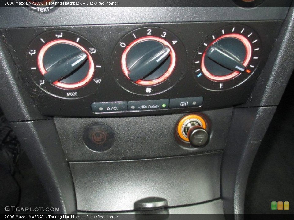 Black/Red Interior Controls for the 2006 Mazda MAZDA3 s Touring Hatchback #76600191