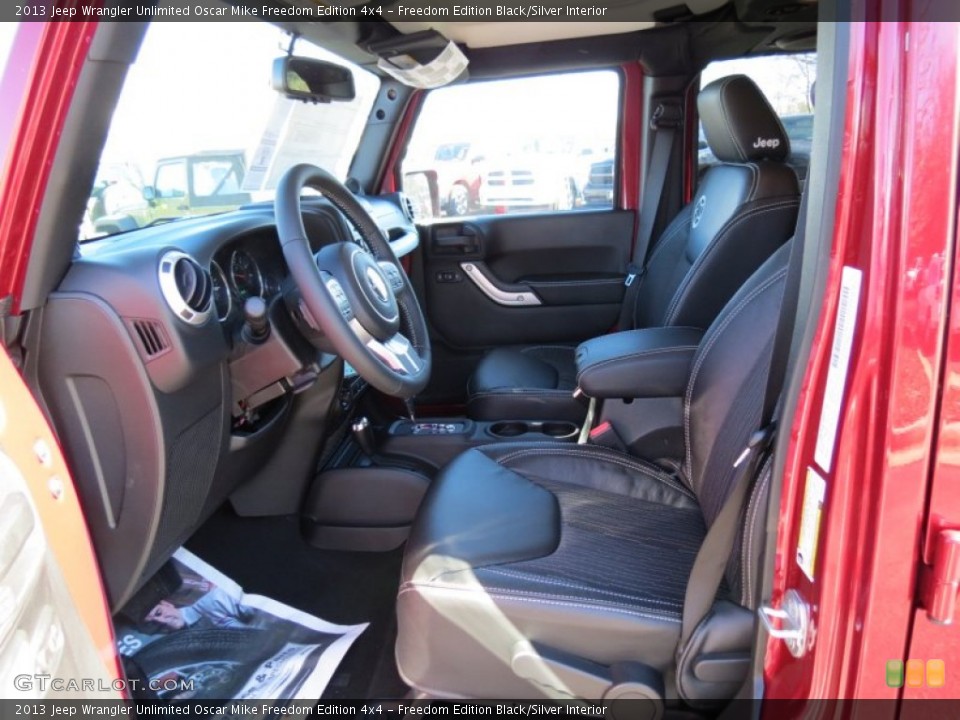 Freedom Edition Black/Silver Interior Photo for the 2013 Jeep Wrangler Unlimited Oscar Mike Freedom Edition 4x4 #76643193