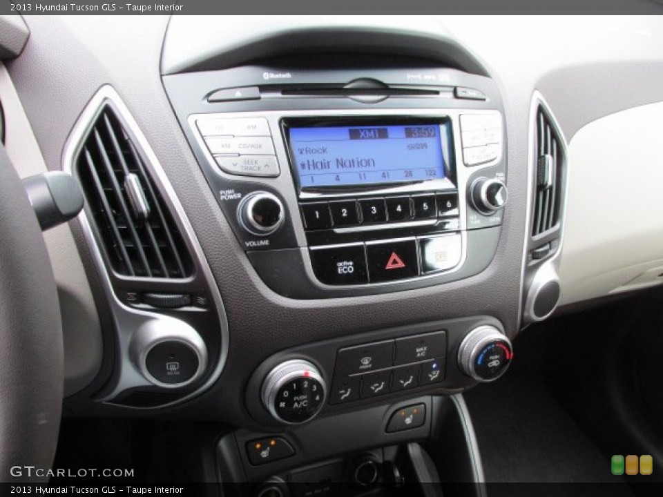 Taupe Interior Controls for the 2013 Hyundai Tucson GLS #76661319