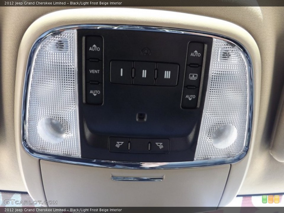 Black/Light Frost Beige Interior Controls for the 2012 Jeep Grand Cherokee Limited #76661329