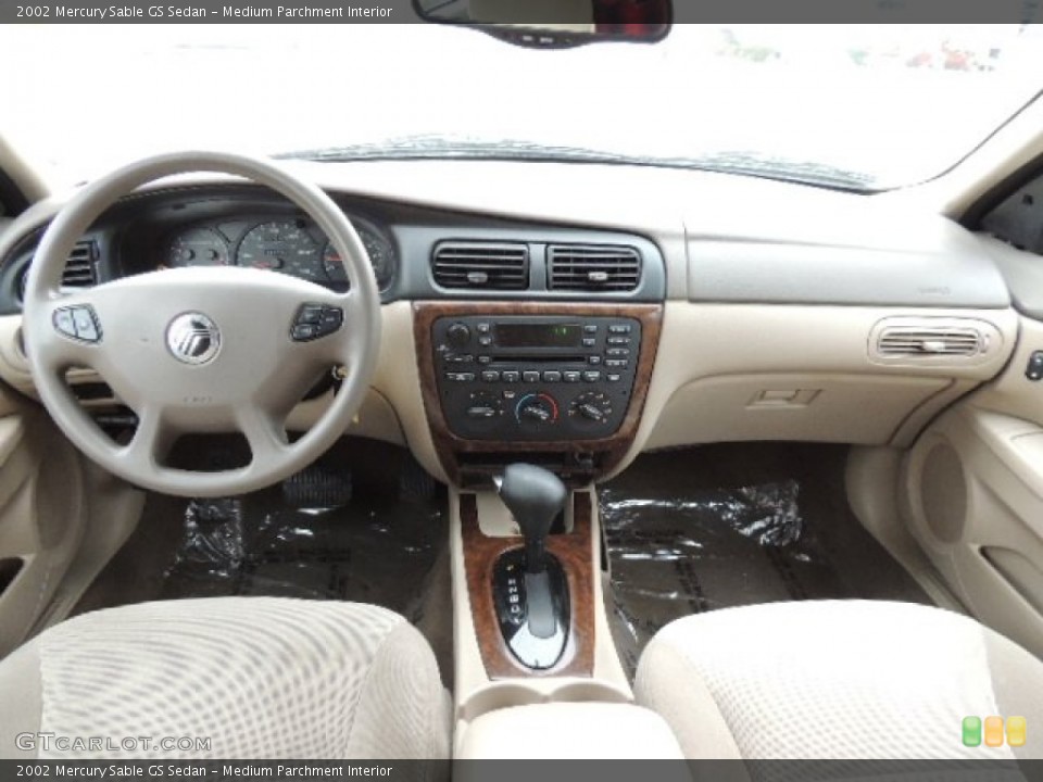Medium Parchment Interior Dashboard for the 2002 Mercury Sable GS Sedan #76663944