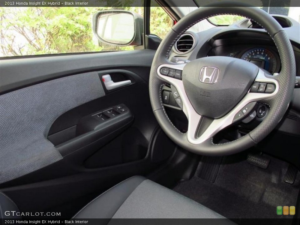 Black Interior Steering Wheel for the 2013 Honda Insight EX Hybrid #76669124