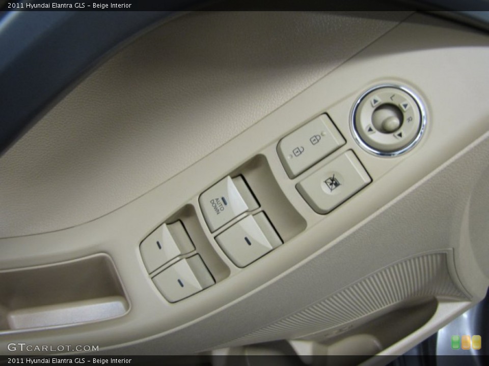 Beige Interior Controls for the 2011 Hyundai Elantra GLS #76673973