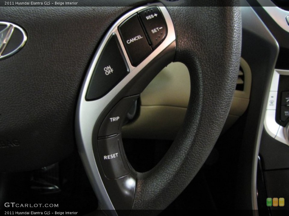 Beige Interior Controls for the 2011 Hyundai Elantra GLS #76674063