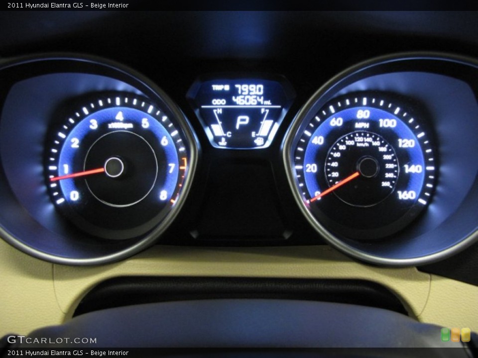 Beige Interior Gauges for the 2011 Hyundai Elantra GLS #76674074